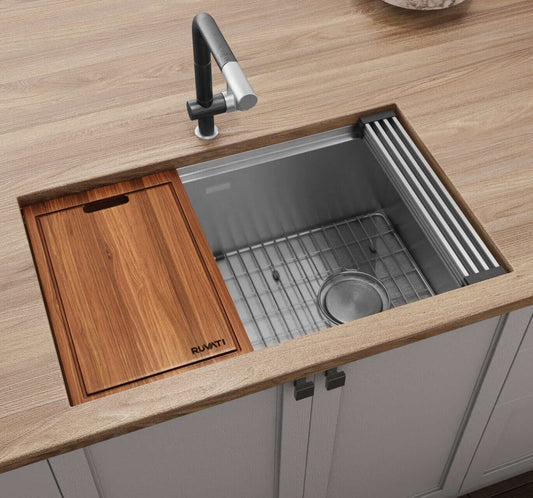 Ruvati Veniso 33" Workstation Slope Bottom Stainless Steel Kitchen Sink RVH8591 with wooden cutting board.