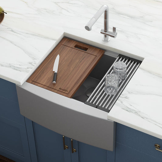 Ruvati Verona 24" Workstation Stainless Steel Kitchen Sink RVH9020 with wooden cutting board and utensils.