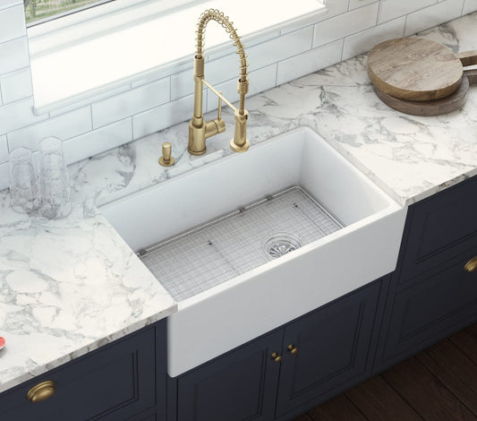 Ruvati Fiamma 30" Fireclay Kitchen Sink RVL2018WR with modern faucet and marble countertop.