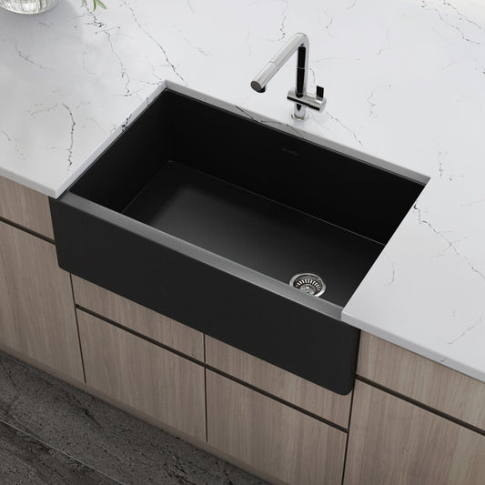 Ruvati Fiamma 30" Modern Offset Drain Fireclay Kitchen Sink RVL4018MBK installed in a contemporary kitchen.