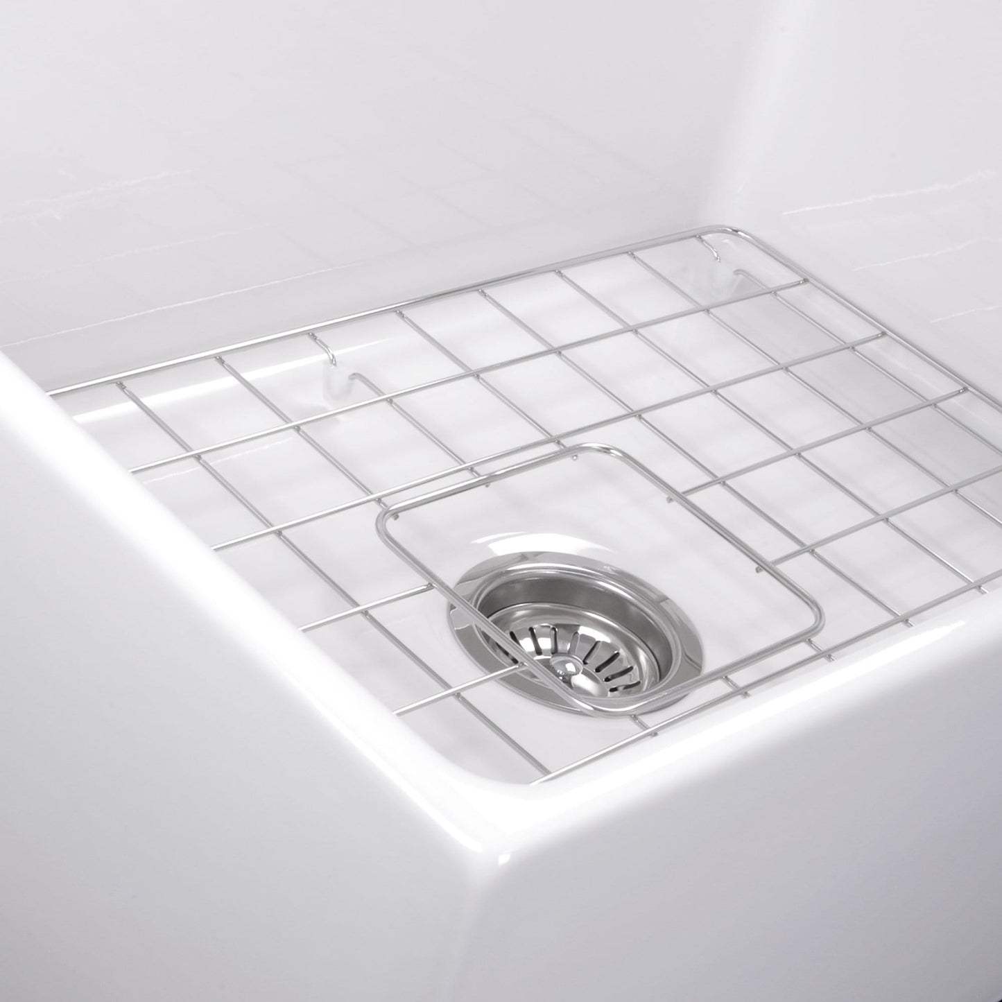 Nantucket 27" Farmhouse Fireclay Sink with Drain and Grid - T-FCFS27 featuring a stainless steel grid and drain.