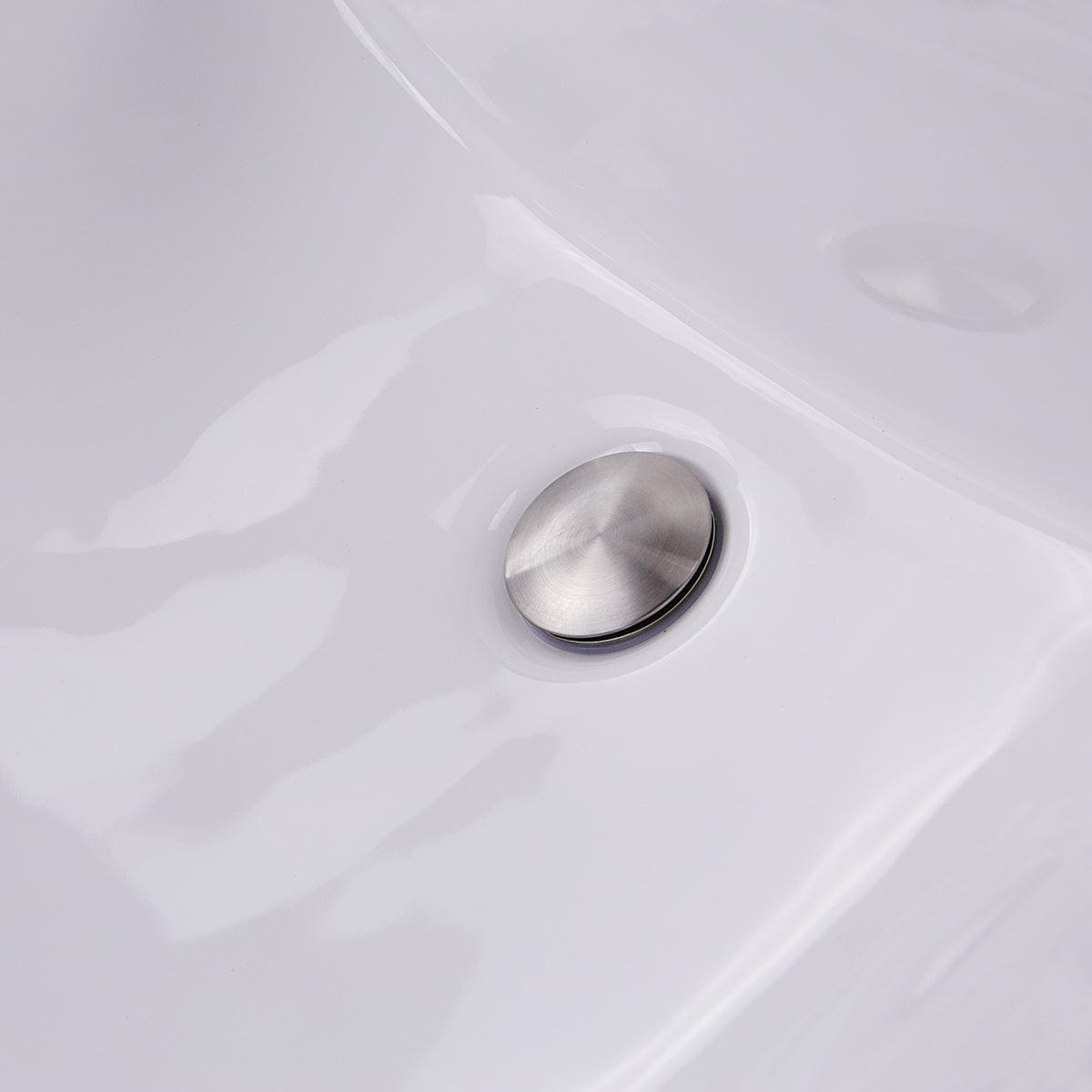 Close-up view of the drain hole for the Nantucket 18" Undermount Ceramic Sink UM-18x13-W.