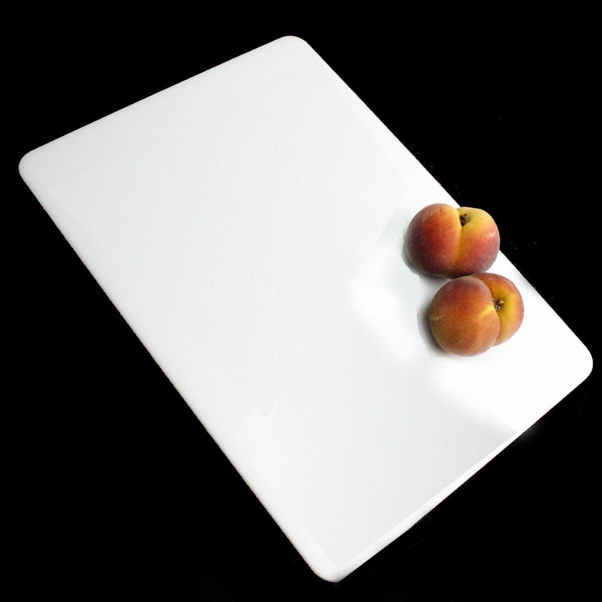 Nantucket 17.75" Cutting Board - CB-ZRPS32 with two peaches on a white surface.