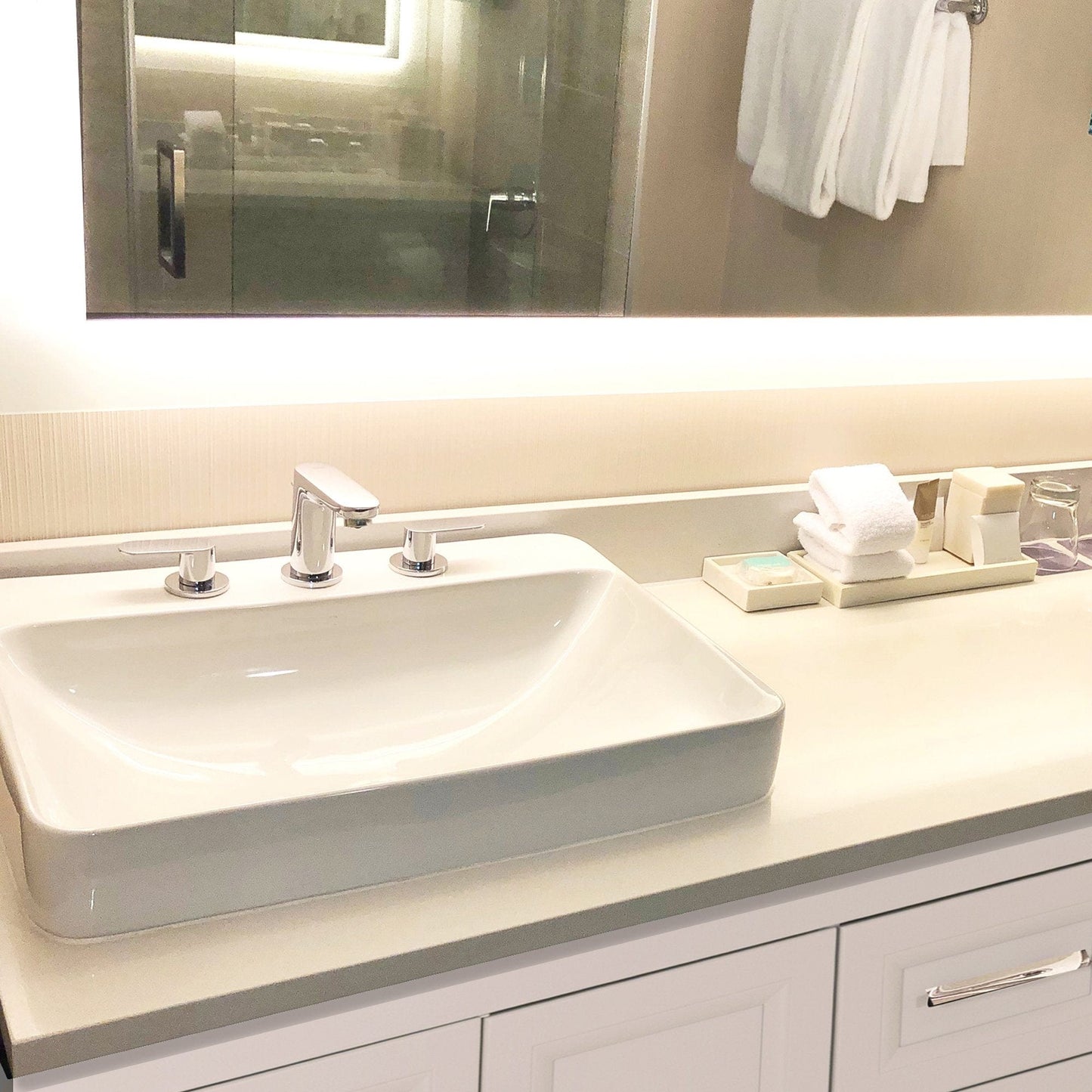 Nantucket 23" 3-hole Rectangular Drop-In Ceramic Vanity Sink - DI-2317-R8 installed in a modern bathroom setting.
