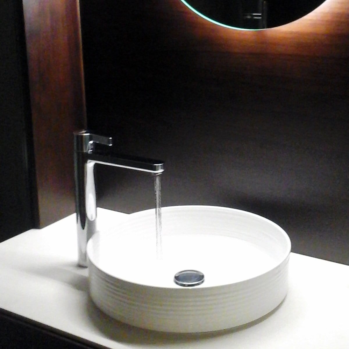 Nantucket Kiel Italian Fireclay Vanity Sink - RC7102WV with modern faucet in elegant bathroom setting