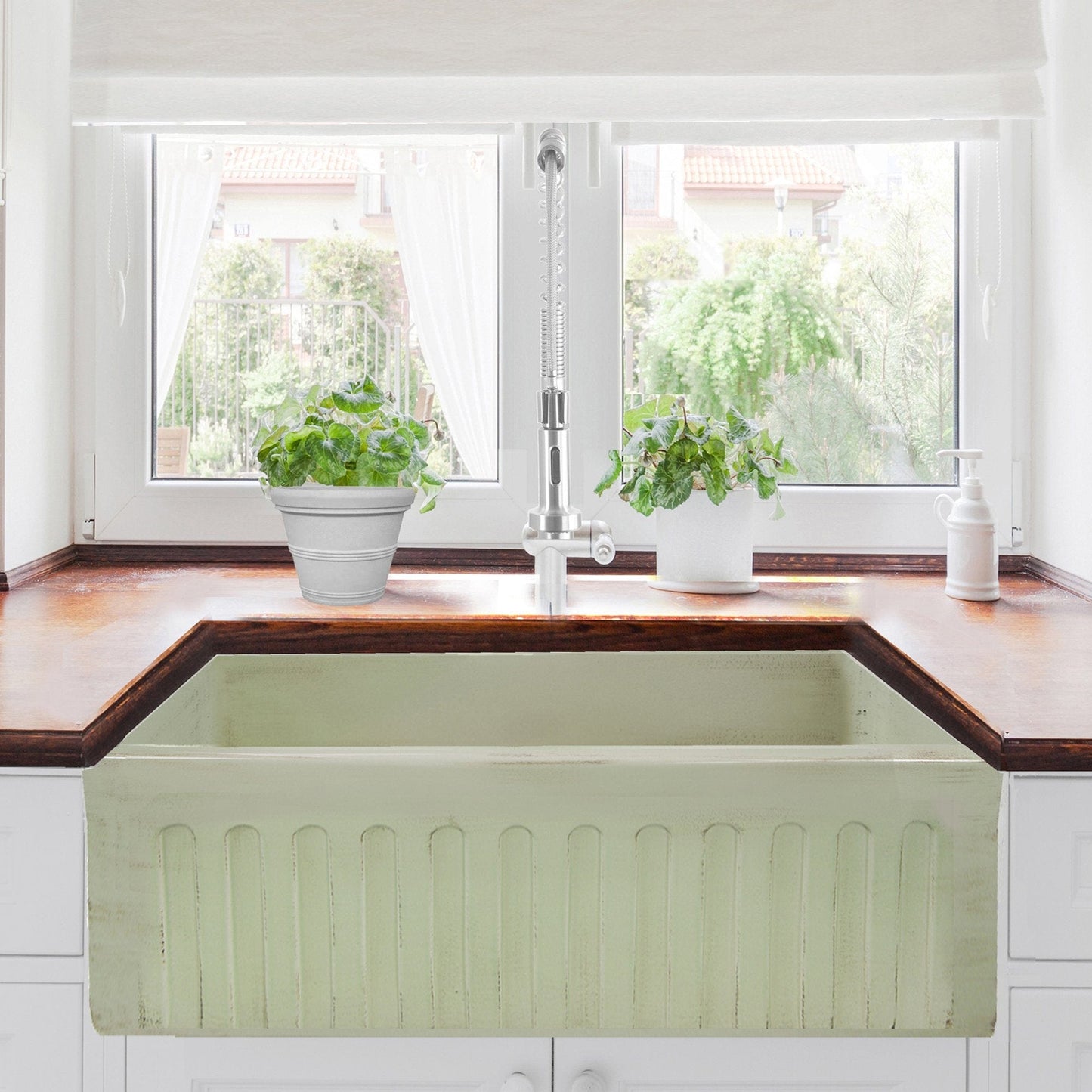 Nantucket 30" Farmhouse Fireclay Sink with Shabby Green Finish - FCFS3020S-ShabbyGreen displayed in a bright kitchen.