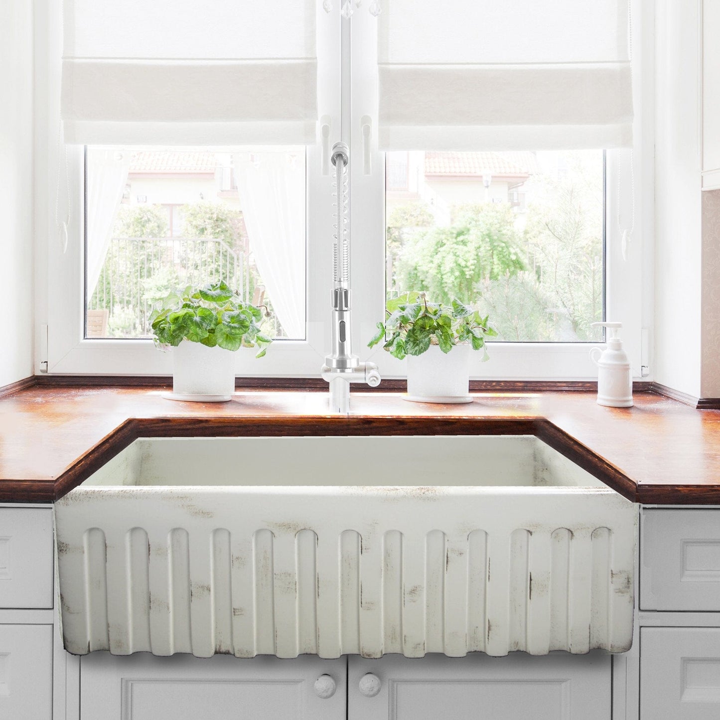 Nantucket 33" Farmhouse Fireclay Sink with Shabby Straw Finish - FCFS3320S-ShabbyStraw in a bright kitchen setting.