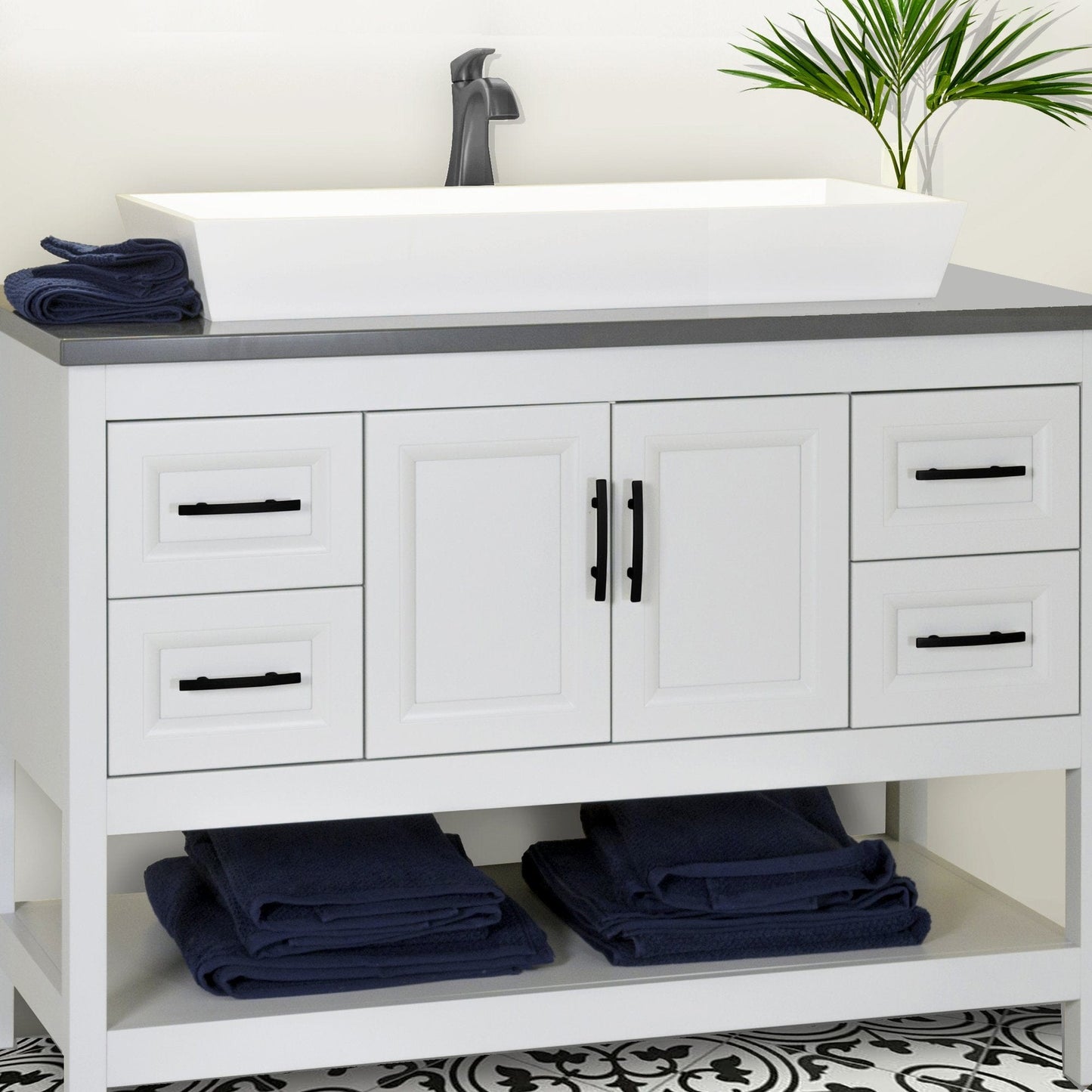 Nantucket Rectangle White Glacierstone Sink - NS-GSTR36 displayed on a modern bathroom vanity with towels.