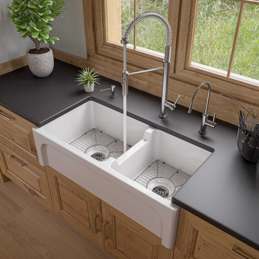 ALFI 36" White Arched Apron Thick Wall Fireclay Double Bowl Farm Sink AB3618ARCH-W showcased in a modern kitchen.