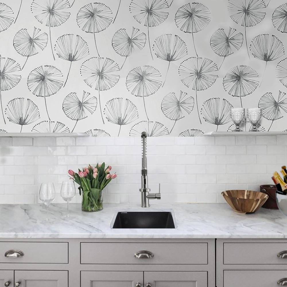 Striking Black Bar Sink - Nantucket 17" Undermount for Bold Entertaining in stylish kitchen with floral wallpaper.