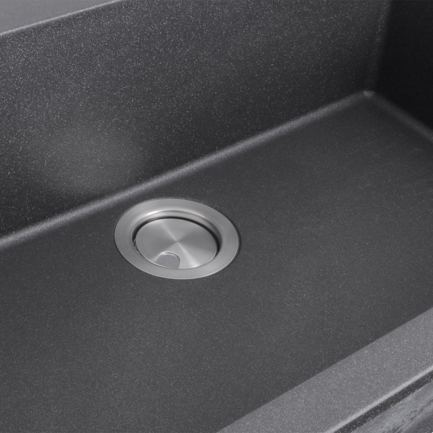 Nantucket 33" Dual-Mount Granite Composite Kitchen Sink Black drain opening detail in sleek black finish.