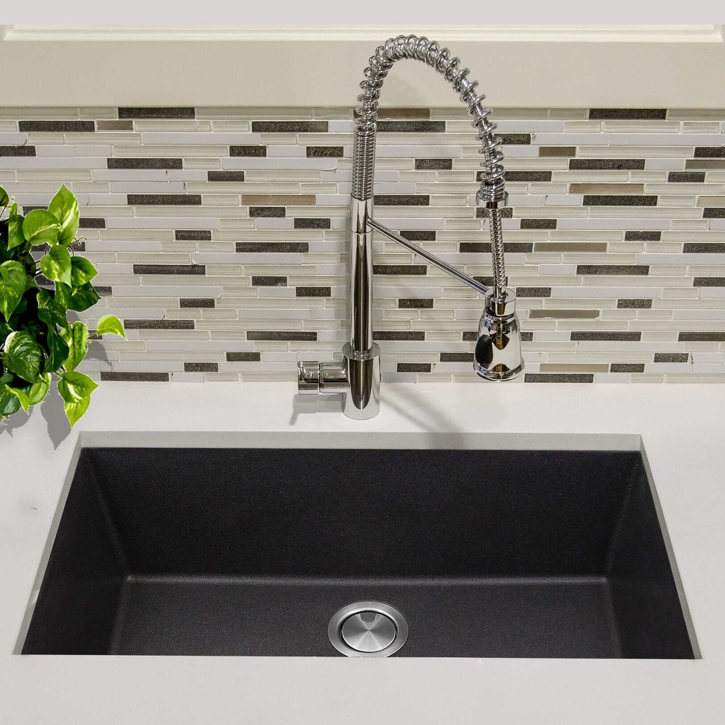 Nantucket 33" Undermount Granite Composite Kitchen Sink Black with modern faucet and stylish backsplash.