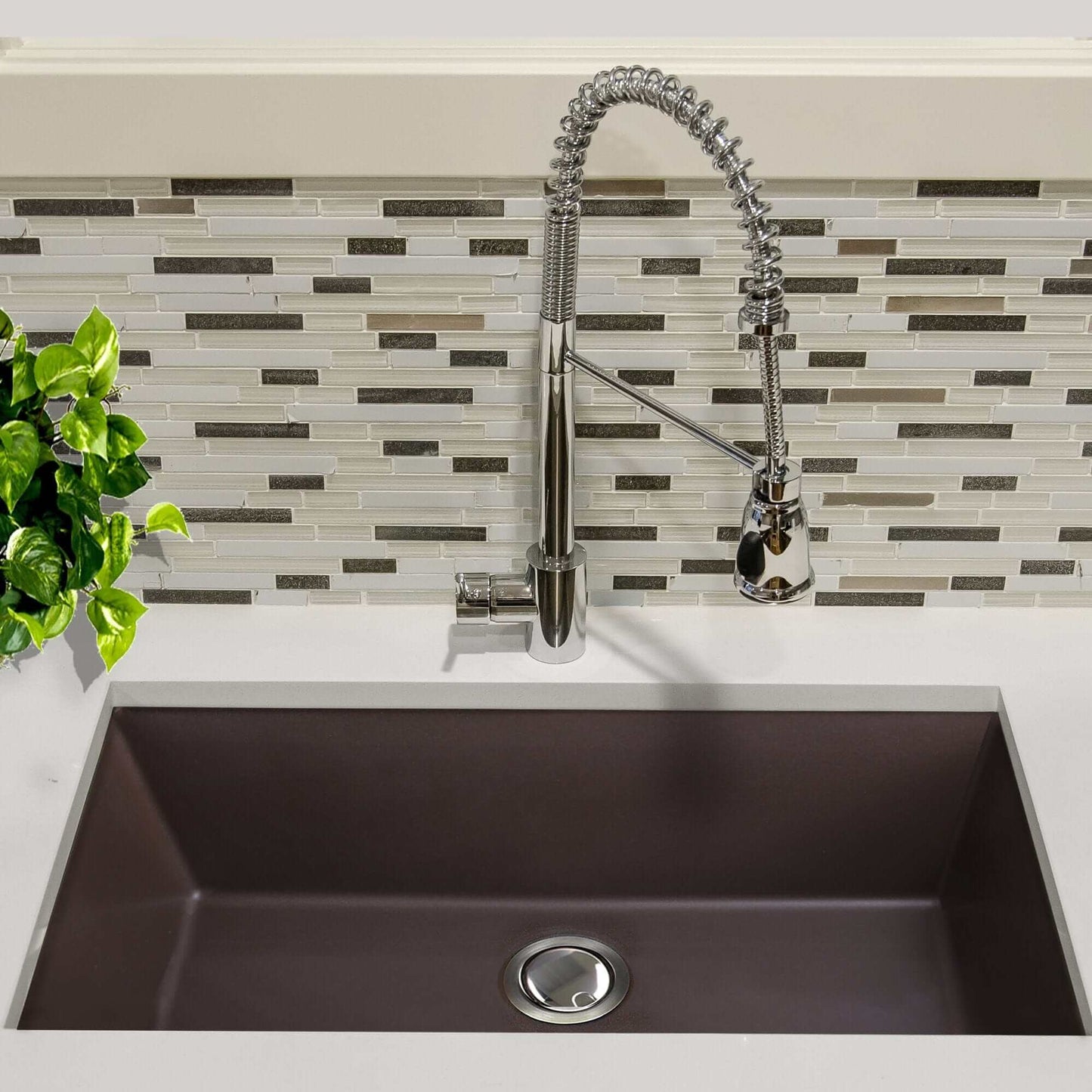 Nantucket 33" Undermount Granite Composite Kitchen Sink Brown with modern faucet and mosaic backsplash.
