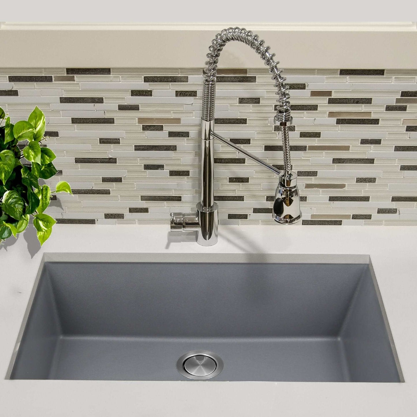 Nantucket 33" Undermount Granite Composite Kitchen Sink Titanium with a sleek metallic finish and modern faucet.