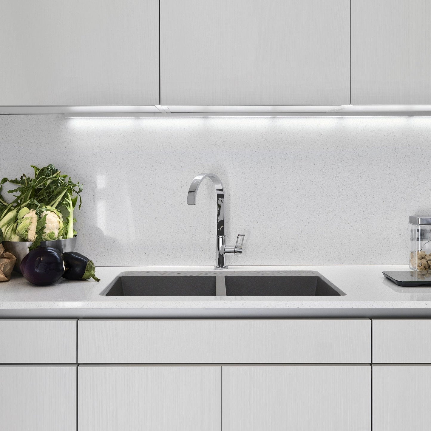 Nantucket 50/50 Double Bowl Undermount Granite Composite Titanium - PR5050-LDTI sink with vegetables in a modern kitchen.