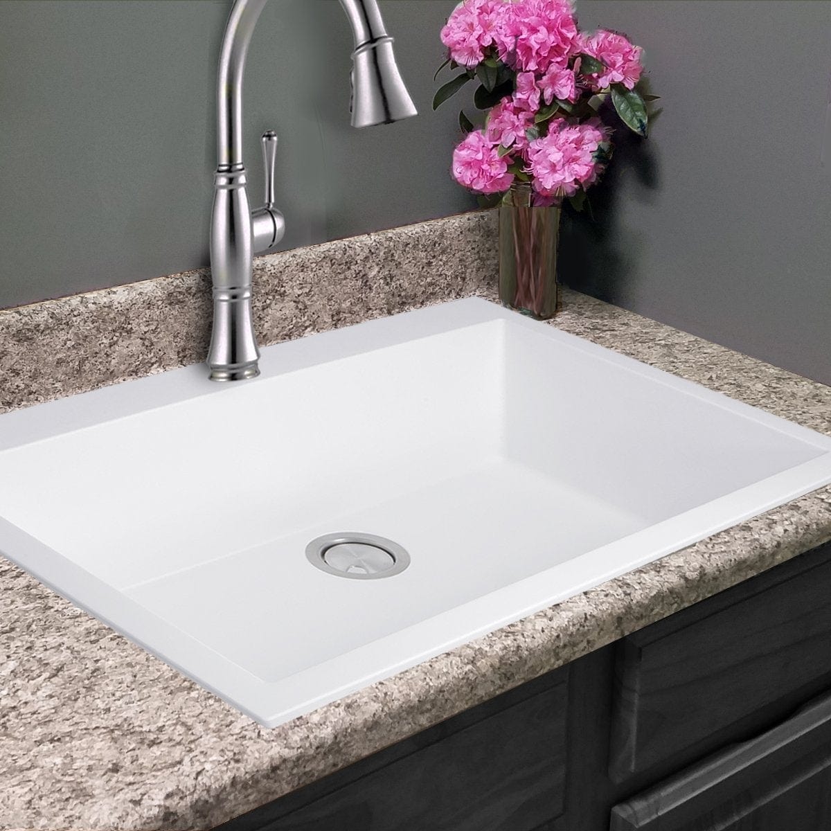 Nantucket Large Single Bowl Dual-Mount Granite Composite White in a stylish kitchen with flowers.