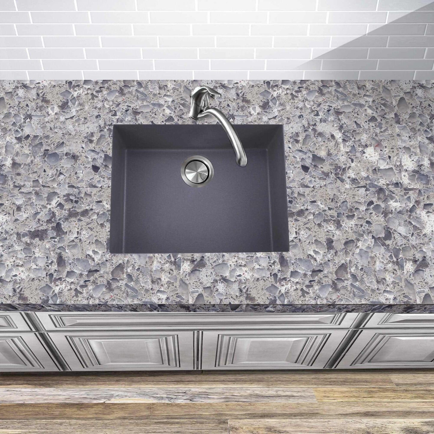 Titanium Small Kitchen Sink - Modern Undermount by Nantucket on a stylish countertop with textured surface.