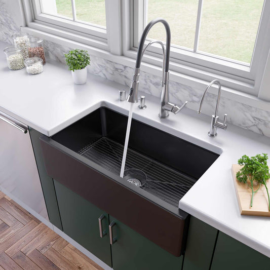 ALFI 33" Black Gloss Reversible Fluted / Smooth Fireclay Farm Sink AB3318HS-BG installed in a modern kitchen with water running.