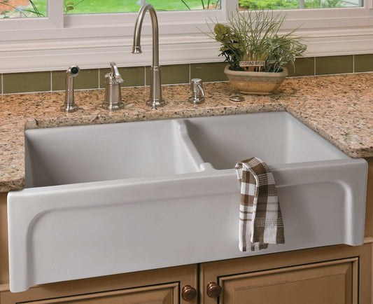 ALFI 36" White Arched Apron Thick Wall Fireclay Double Bowl Farm Sink AB3618ARCH-W on a kitchen counter.