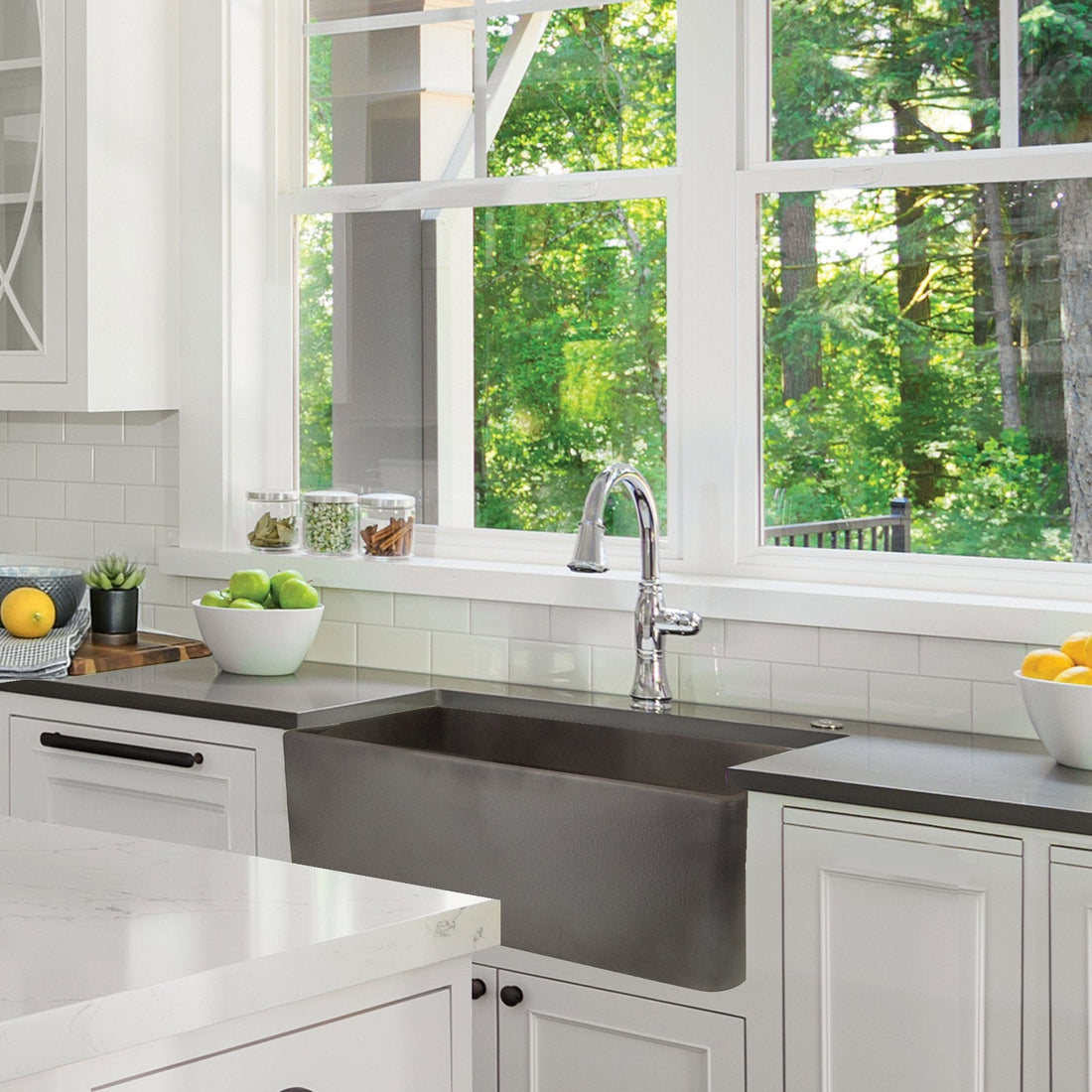 Nantucket 30 inch concrete-finish fireclay farmhouse sink installed in a modern kitchen