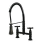 Kingston Brass GS1273BEX Essex Double-Handle Deck-Mount Pre-Rinse Bridge Kitchen Faucet, Antique Brass in Matte Black finish.