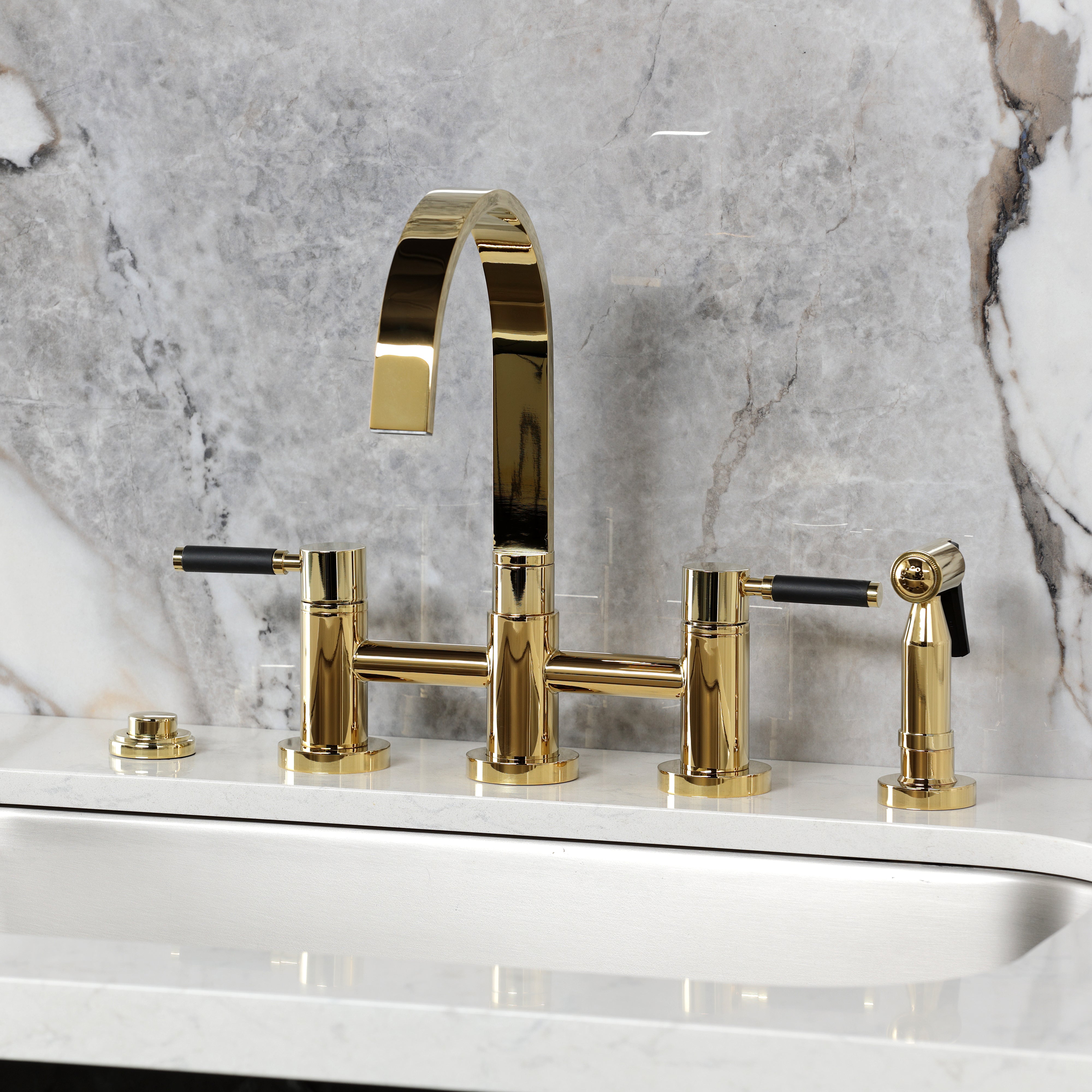Kingston KS8267DKLBS Kaiser Bridge Kitchen Faucet with Brass Sprayer, Brushed Brass shown on modern countertop