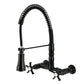 Kingston Brass GS1243NX Hamilton Double-Handle Wall-Mount Pre-Rinse Bridge Kitchen Faucet, Antique Brass in Matte Black finish.