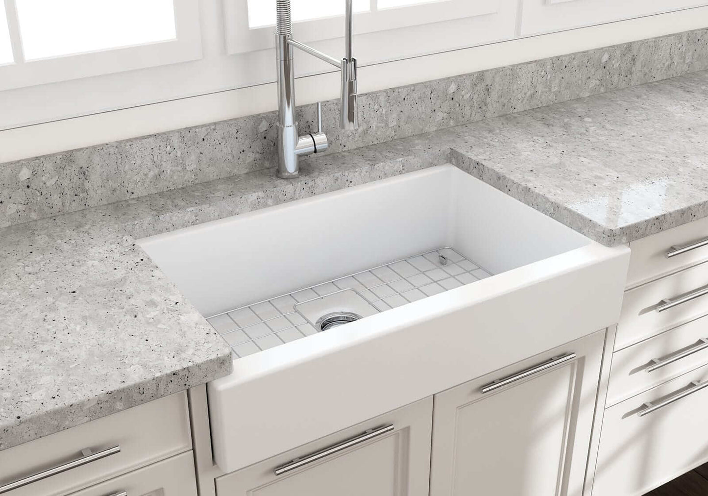 BOCCHI NUOVA 34" Single Bowl Kitchen Sink with Protective Bottom Grid and Strainer in modern kitchen countertop.