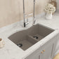 BOCCHI CAMPINO DUO 33" Dual Mount 60/40 Double Bowl Granite Kitchen Sink in Mink with Strainers installed in modern kitchen.