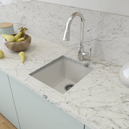 CAMPINO UNO 16" Single Bowl Dual Mount Granite Bar Sink with Strainer, Milk White finish, top view on marble countertop with faucet.