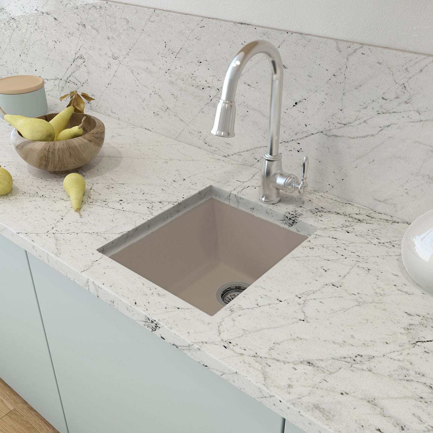 CAMPINO UNO 16" Single Bowl Dual Mount Granite Bar Sink with Strainer on marble countertop with faucet and fruit bowl.