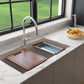 BOCCHI BAVENO LUX 34" Double Bowl Granite Composite Kitchen Sink with Integrated Workstation and Accessories  in Mink color, installed in kitchen and featuring cutting board and colander