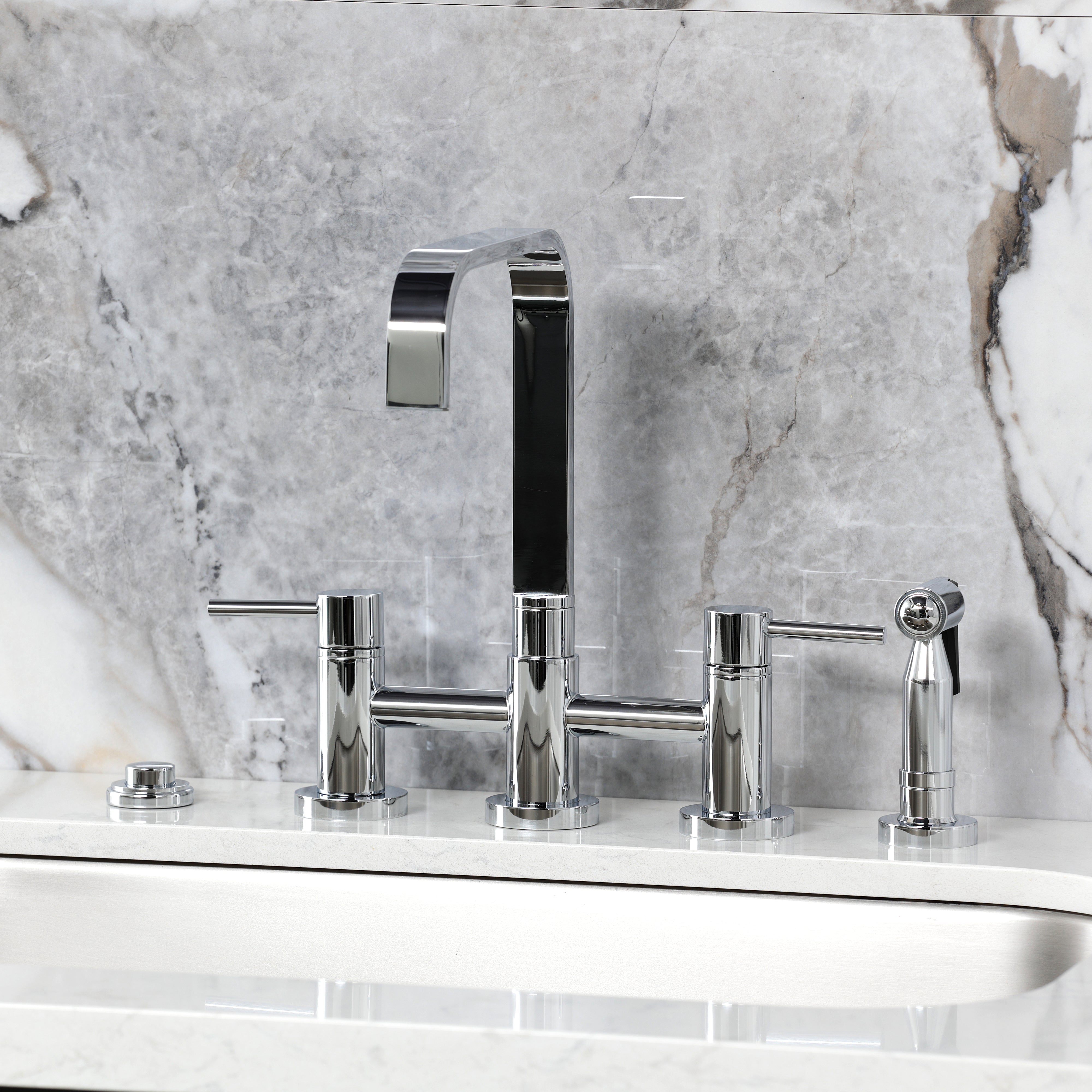 Kingston KS8257DLBS Concord Bridge Kitchen Faucet with Brass Sprayer, Brushed Brass installed in a stylish kitchen