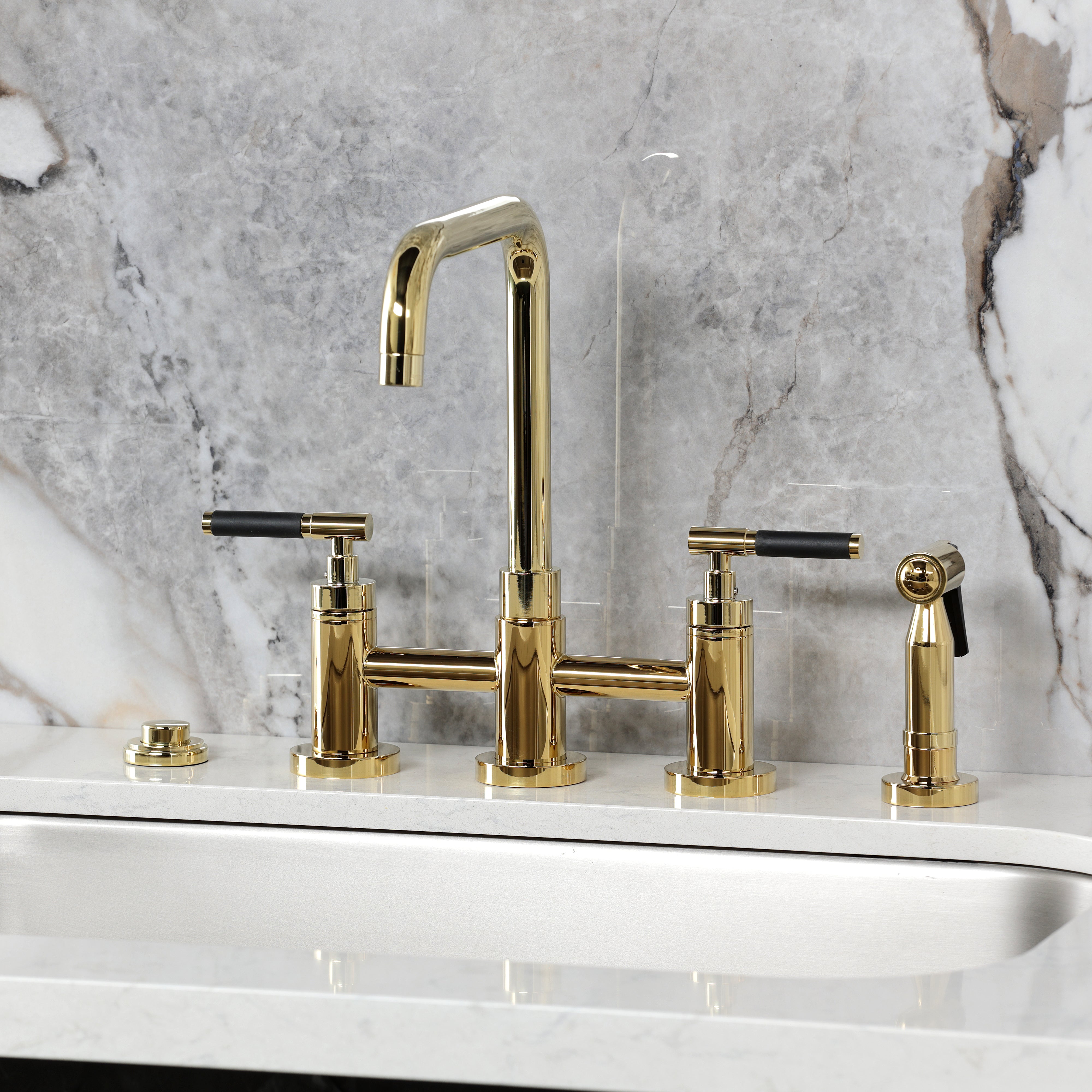 Kingston KS8287CKLBS Kaiser Bridge Kitchen Faucet with Brass Sprayer, Brushed Brass on marble countertop.