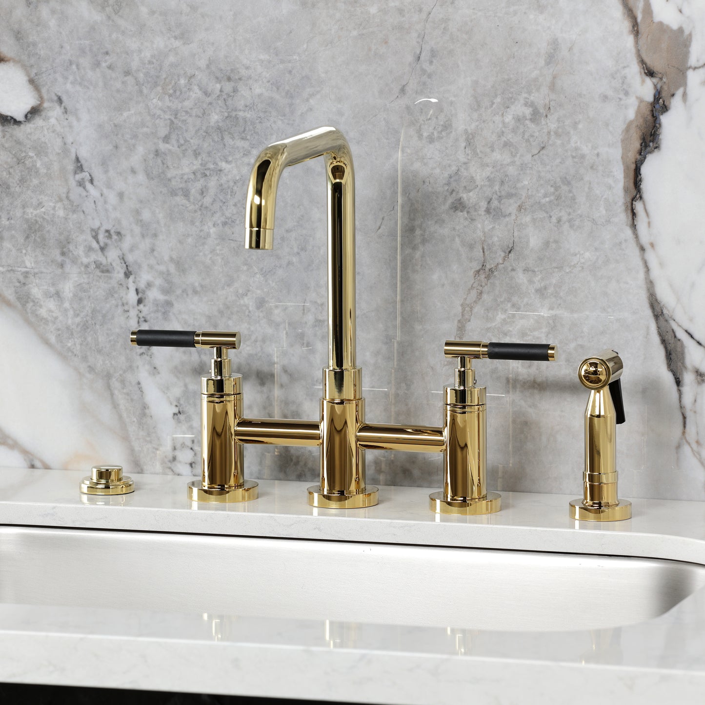 Kingston KS8287CKLBS Kaiser Bridge Kitchen Faucet with Brass Sprayer, Brushed Brass on marble countertop.