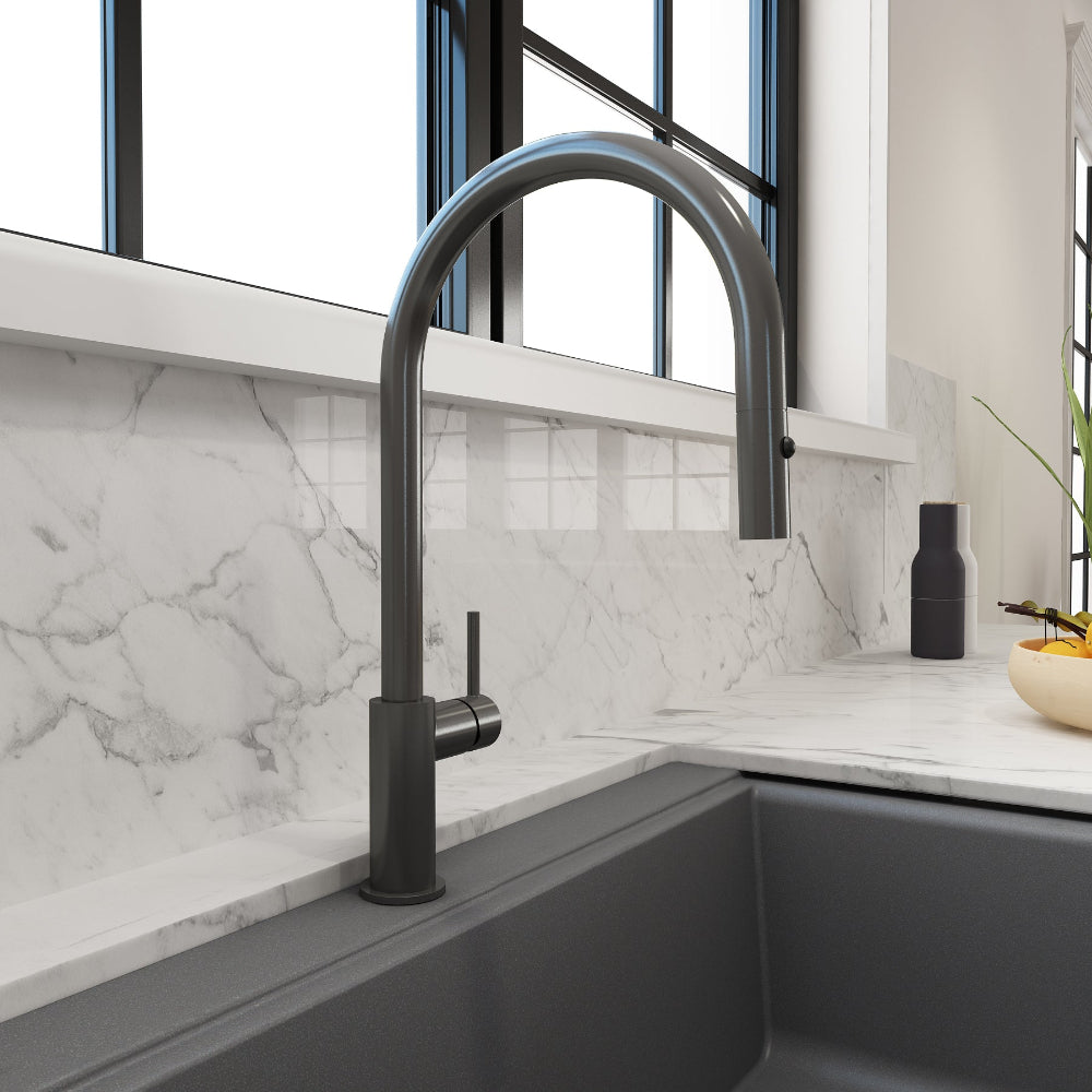 Gunmetal Bocchi Baveno Duo Faucet paired with a Gray Granite Sink