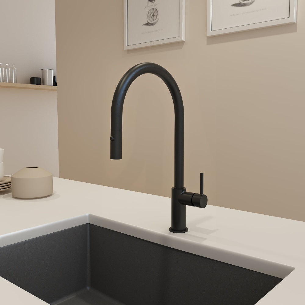 Matte Black Bocchi Baveno Duo Faucet paired with black granite sink