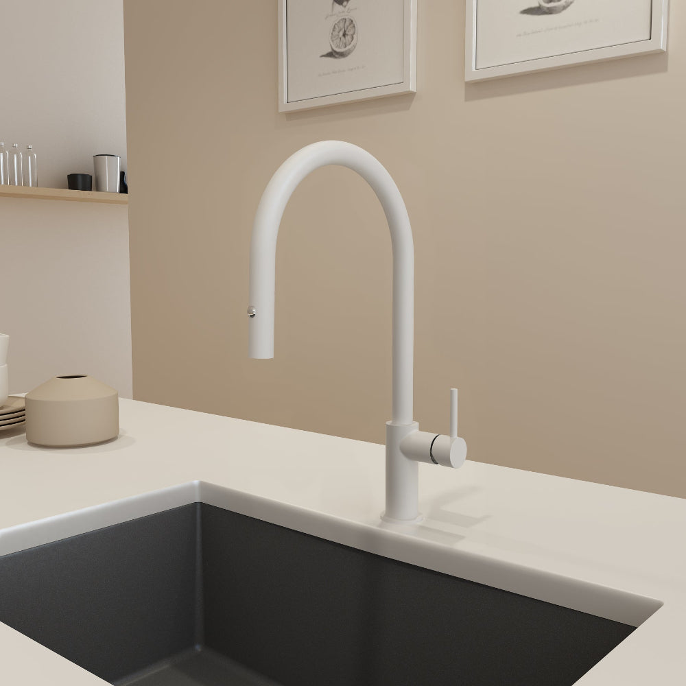 Matte White Bocchi Baveno Faucet paired with gray granite sink.