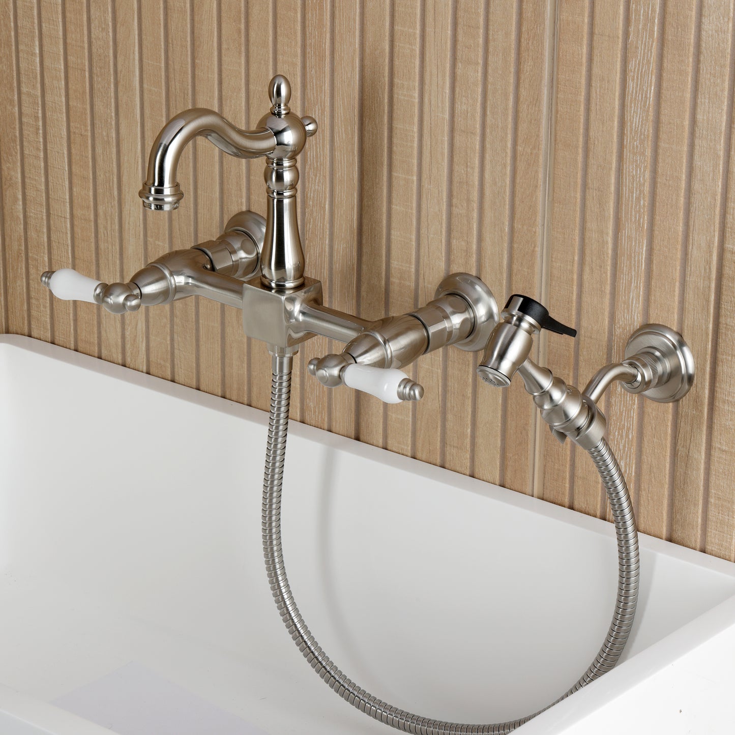 Kingston KS2443PLBS Heritage Two-Handle Wall Mount Bridge Kitchen Faucet with Brass Sprayer, Antique Brass