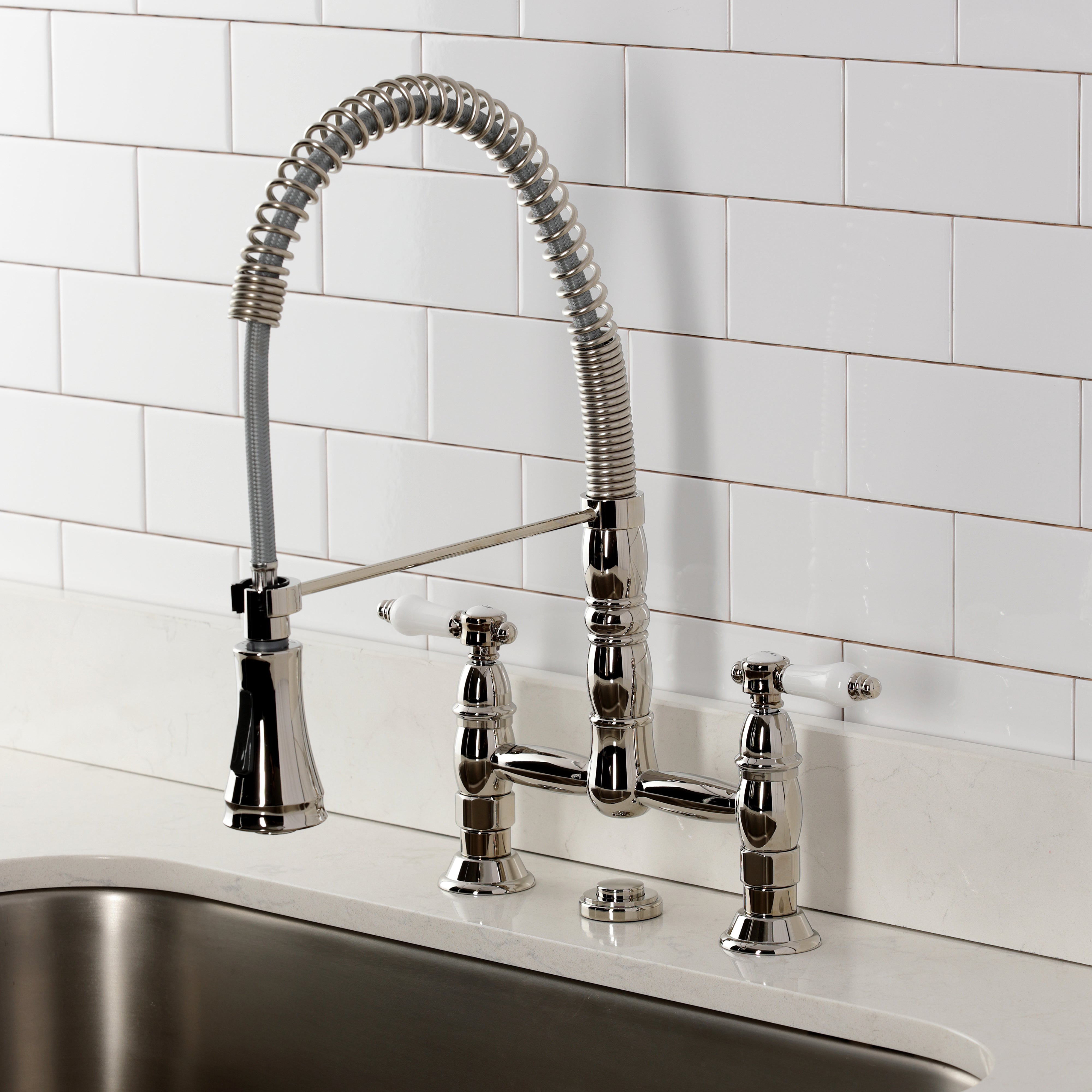 Kingston Brass GS1273BPL Bel-Air Double-Handle Deck-Mount Pre-Rinse Bridge Kitchen Faucet, Antique Brass with polished finish