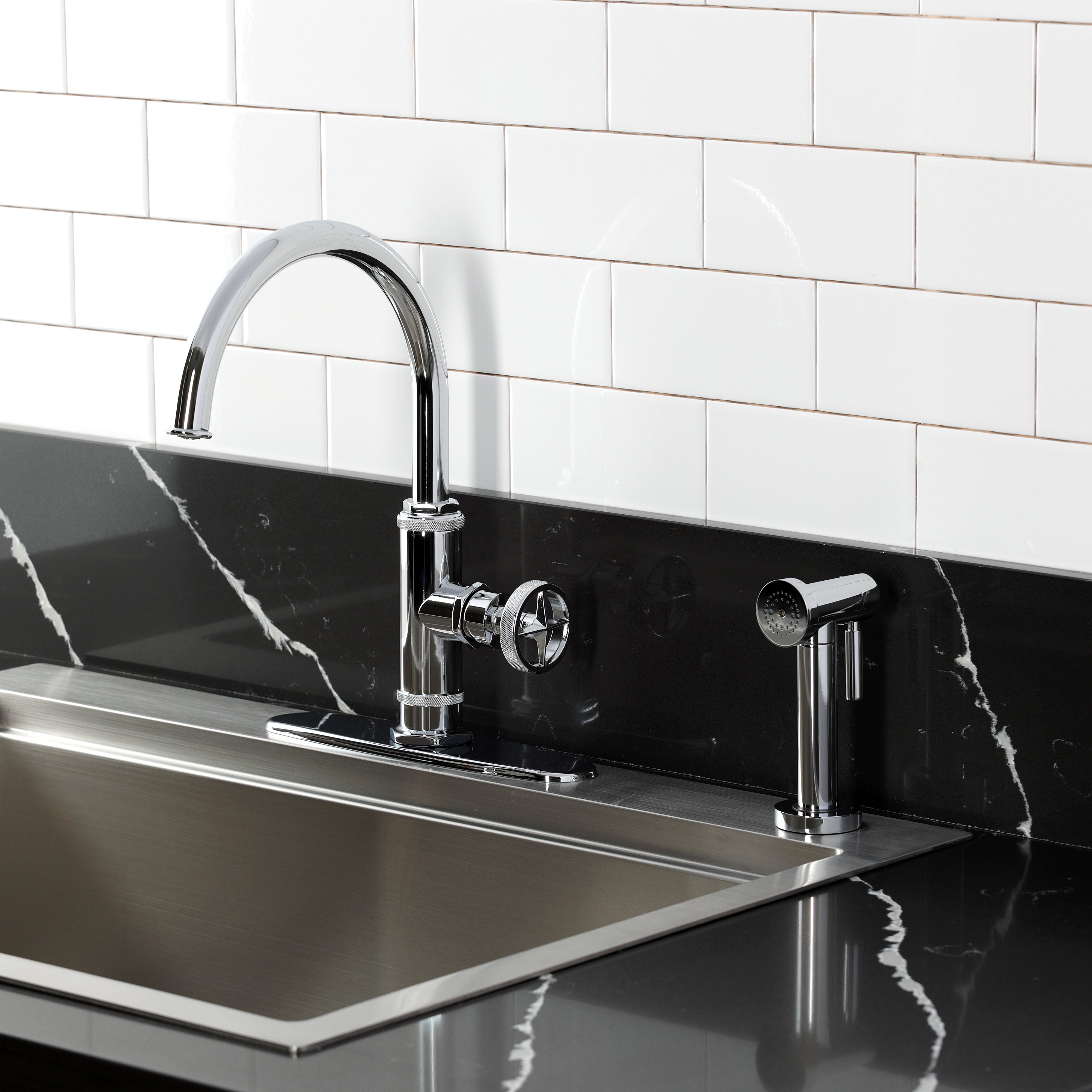 Kingston Brass KSD2433RNX Ostro Single-Handle Kitchen Faucet, Antique Brass on a modern kitchen sink.