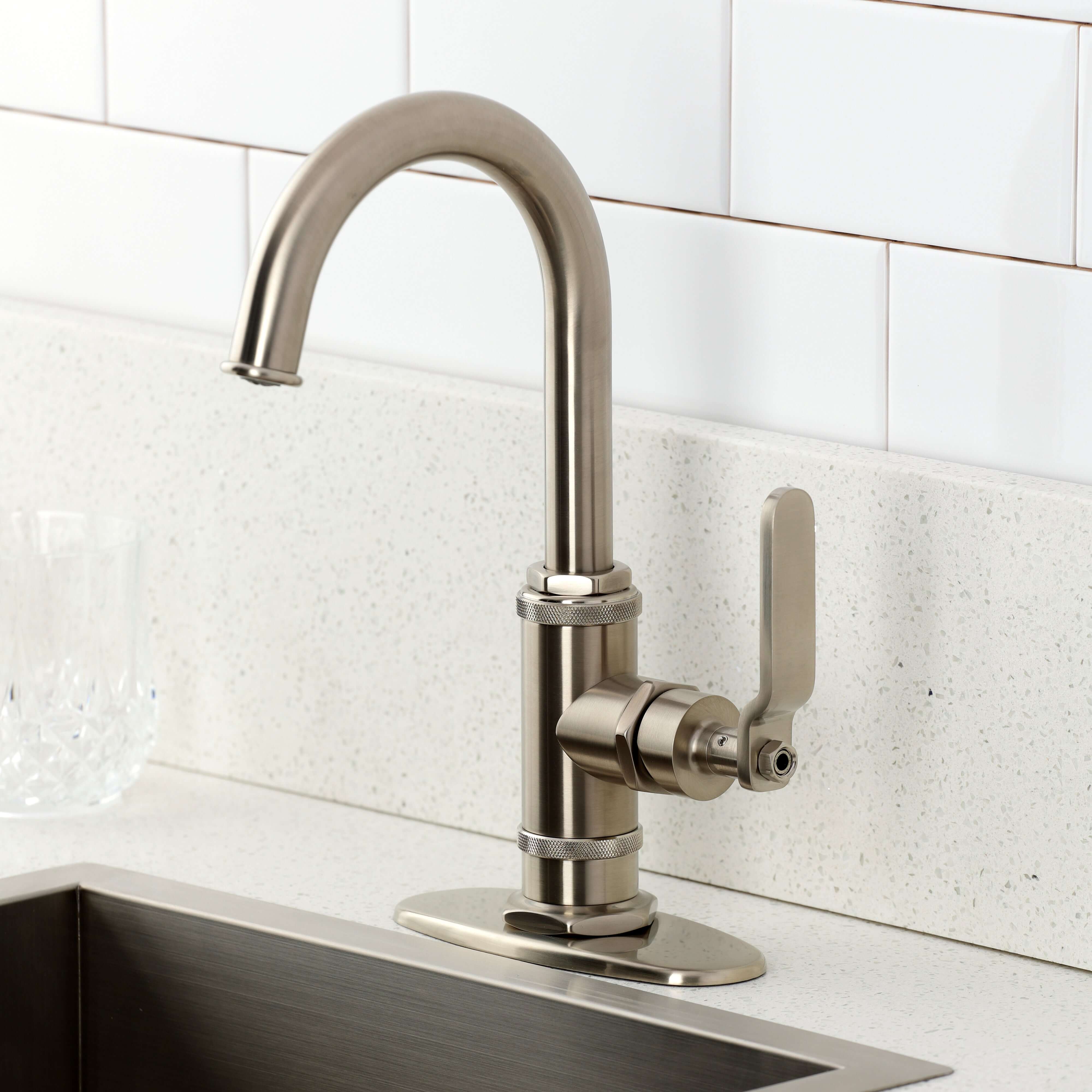 Kingston Brass KSD8503KL Whitaker Single-Handle Bar Faucet, Antique Brass installed in modern kitchen setting