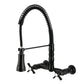 Kingston Brass GS1243ZX Millennium Double-Handle Wall-Mount Pre-Rinse Bridge Kitchen Faucet, Antique Brass in Matte Black finish.