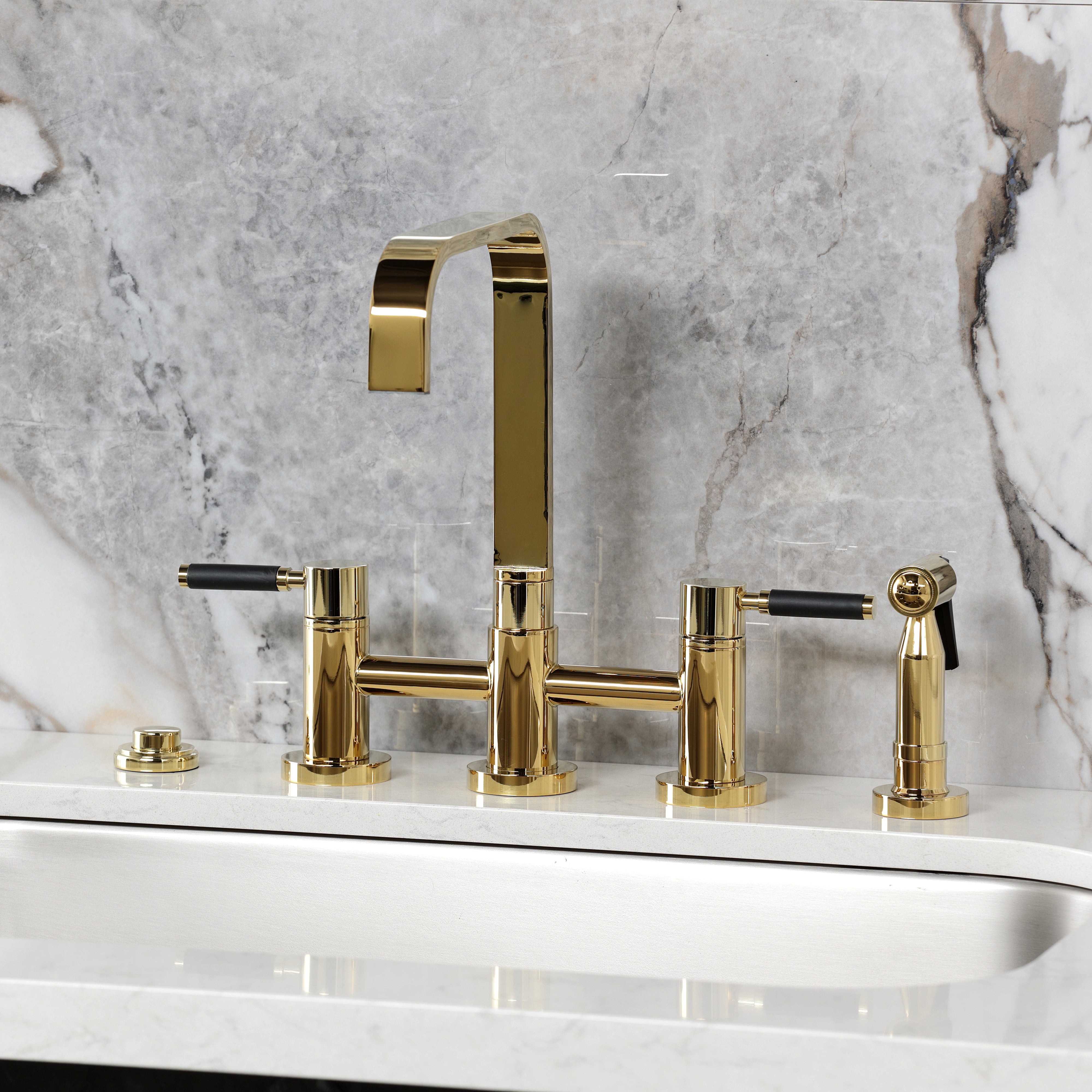 Kingston KS8257DKLBS Kaiser Bridge Kitchen Faucet with Brass Sprayer, Brushed Brass on kitchen countertop