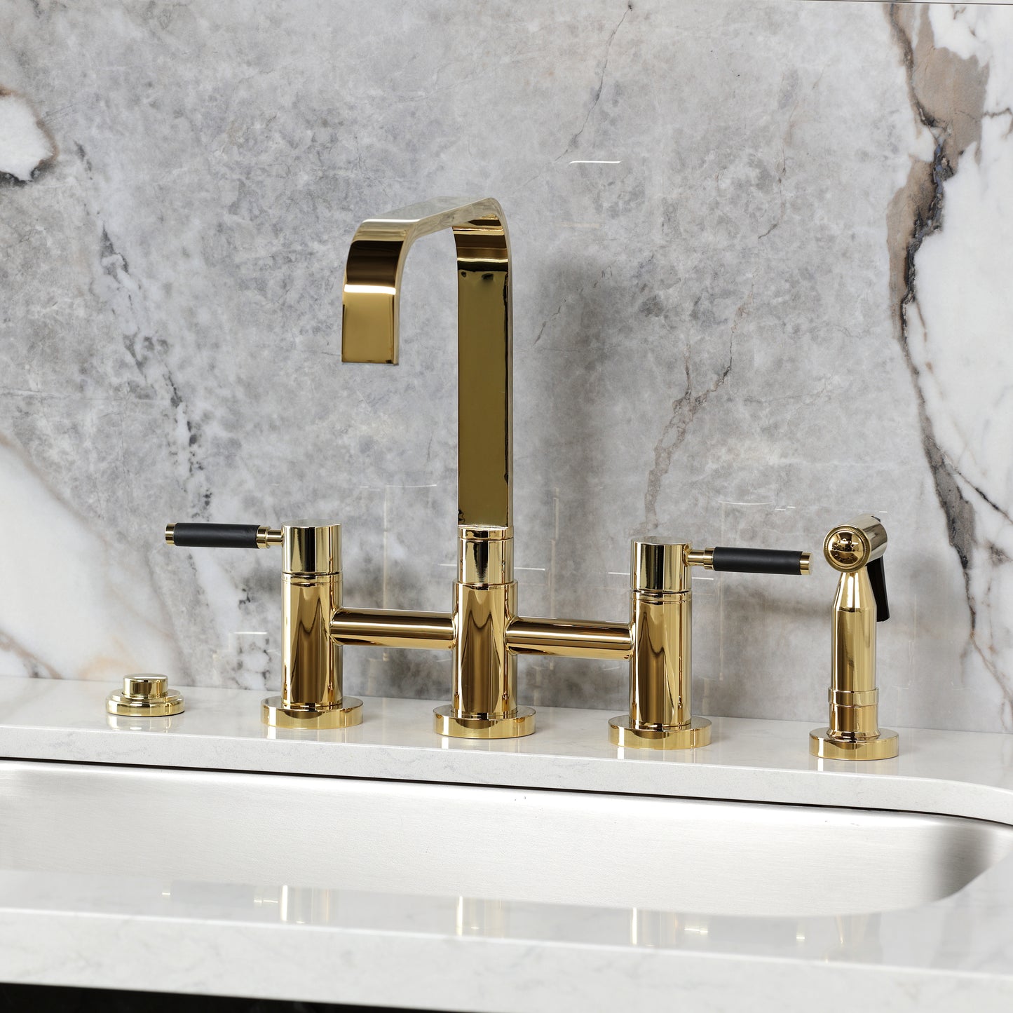 Kingston KS8257DKLBS Kaiser Bridge Kitchen Faucet with Brass Sprayer, Brushed Brass on kitchen countertop