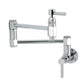 Kingston Brass KS5103DL Concord Wall Mount Pot Filler Faucet, Antique Brass in polished chrome finish features dual lever handles.