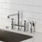 Kingston KS7277BPLBS Bel-Air Bridge Kitchen Faucet with Brass Sprayer, Brushed Brass in a traditional kitchen setting.