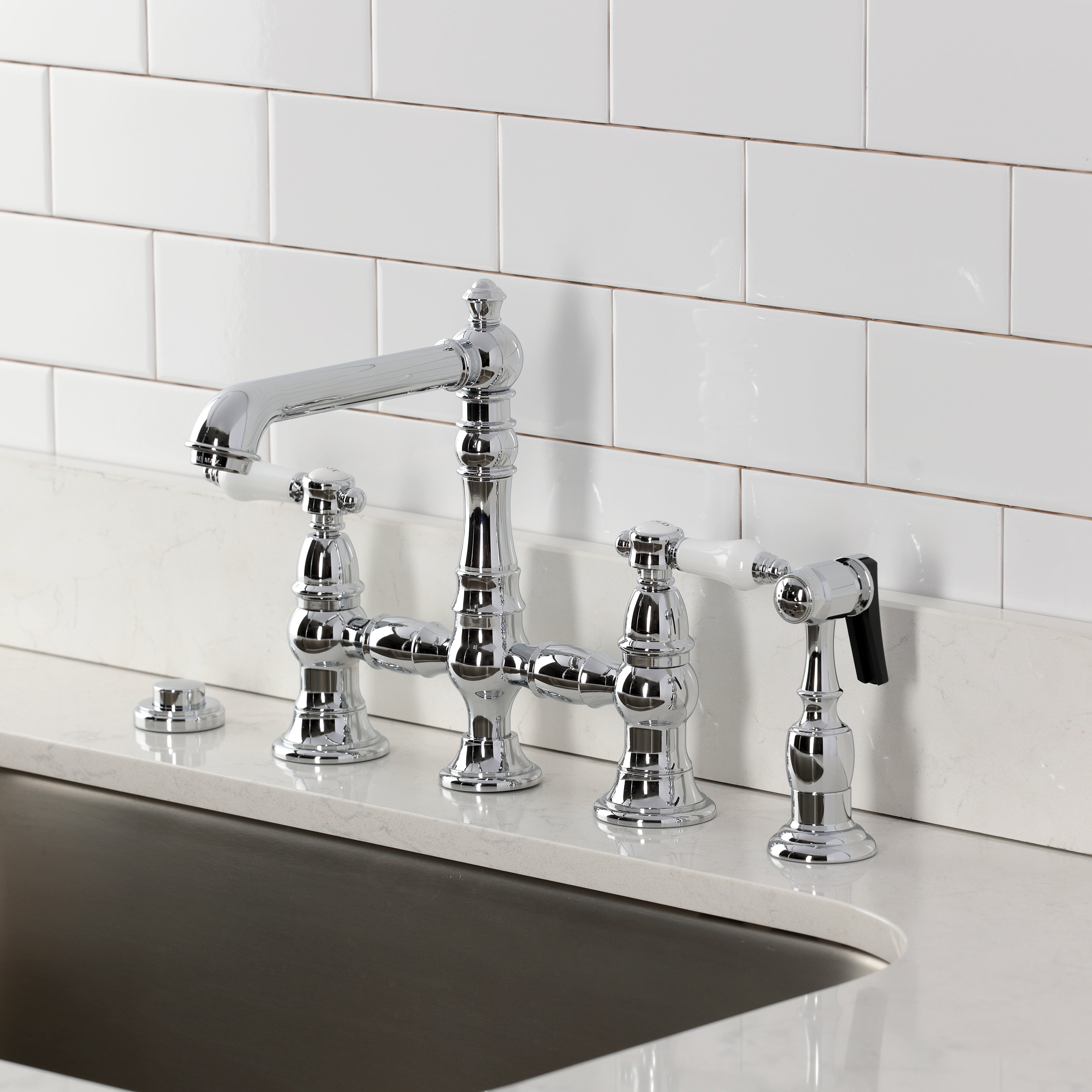 Kingston KS7277BPLBS Bel-Air Bridge Kitchen Faucet with Brass Sprayer, Brushed Brass in a traditional kitchen setting.