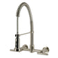 Kingston Brass GS8187CML Manhattan Double-Handle Wall-Mount Pre-Rinse Bridge Kitchen Faucet, Brushed Brass.