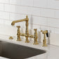 Kingston KS7277BPLBS Bel-Air Bridge Kitchen Faucet with Brass Sprayer, Brushed Brass in a traditional kitchen setting.